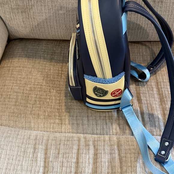 Disney Monsters University varsity jacket Navy and Cream Backpack 10 x 8 - Picture 6 of 10